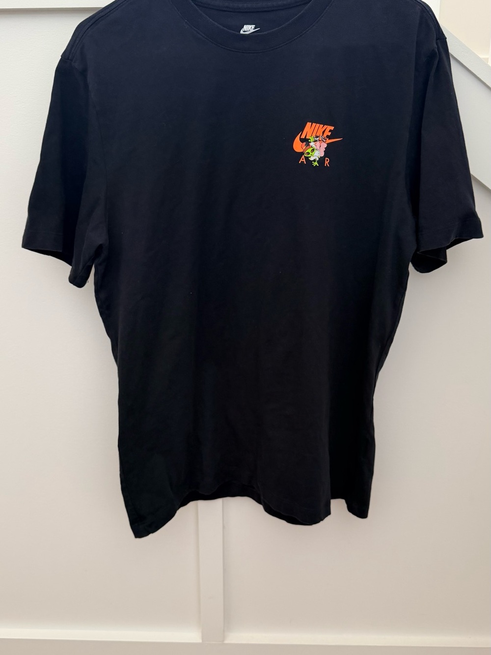 Nike Black Short-Sleeve Tee with Small Multicolor Chest Logo
